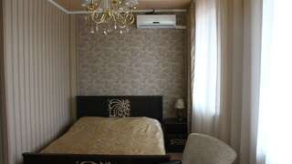 Гостевой дом Сафари Астрахань Номер улучшенный семейный с 1 односпальной и 1 двуспальной кроватью-7